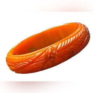 Antique early plastic celluloid colorful Orange Carved Bangle Bracelet